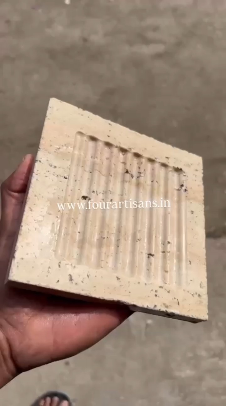 CNC travertine carving and custom natural stone detail at Four Artisans in Pune